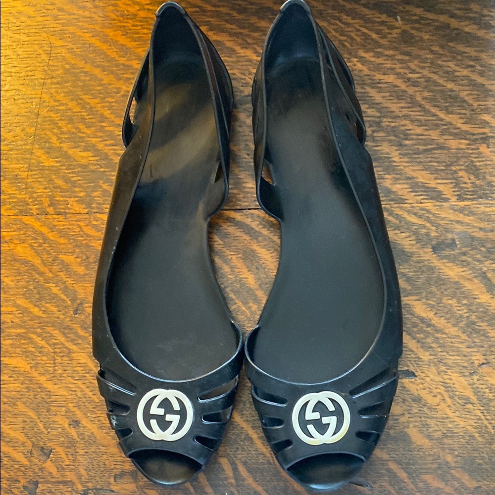 Gucci black jelly flats